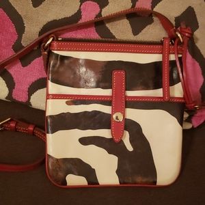 Dooney & Burke Zebra print letter carrier